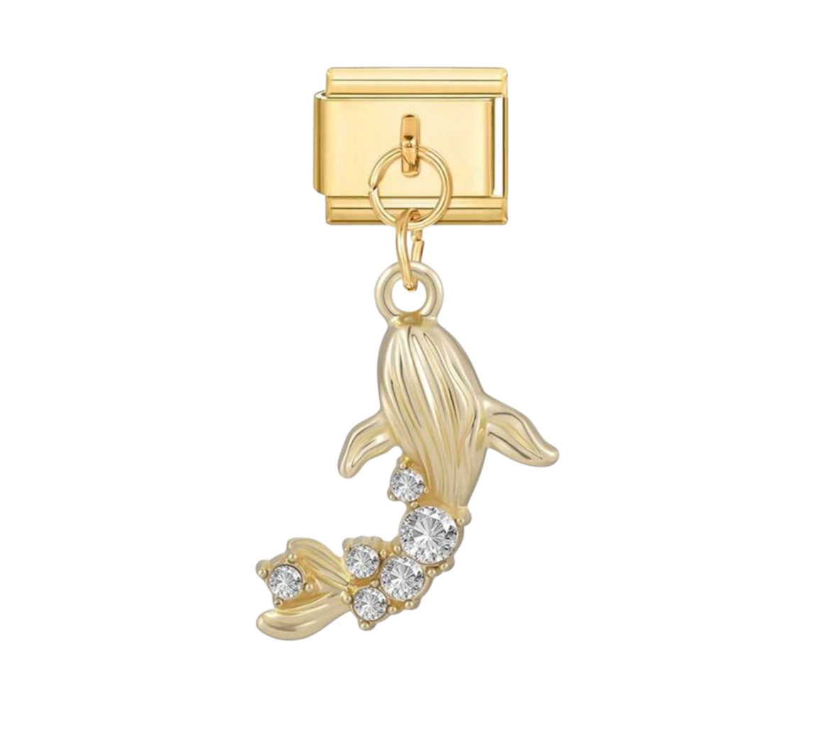 Dangling whale charm